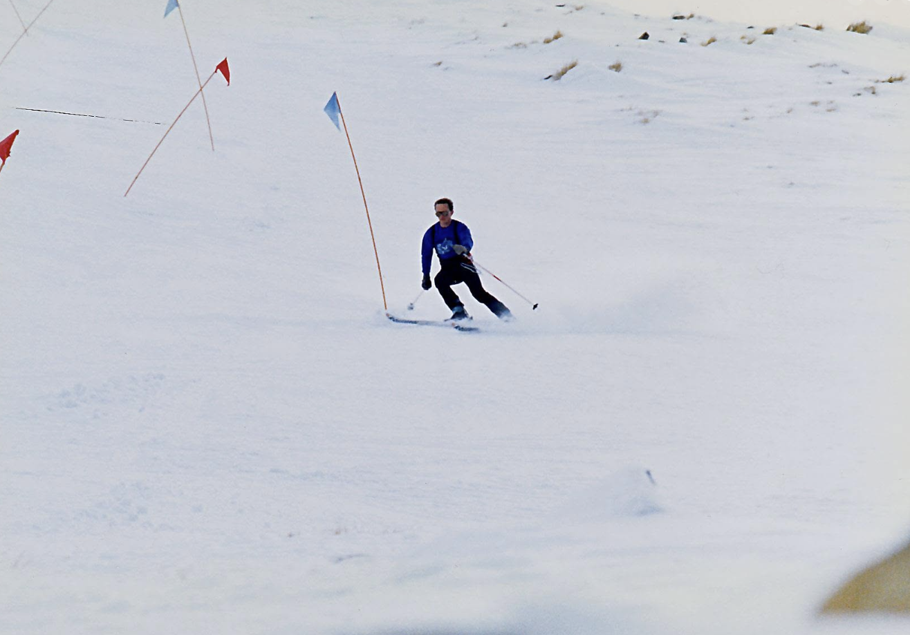 Ray Telfor carving through a slalom gate on the main slope